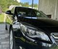 Черный Опель Инсигния, объемом двигателя 2 л и пробегом 165 тыс. км за 9885 $, фото 1 на Automoto.ua