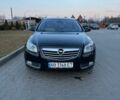 Чорний Опель Інсігнія, об'ємом двигуна 1.96 л та пробігом 229 тис. км за 9699 $, фото 1 на Automoto.ua