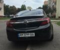 Черный Опель Инсигния, объемом двигателя 2 л и пробегом 220 тыс. км за 11500 $, фото 2 на Automoto.ua