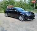 Черный Опель Инсигния, объемом двигателя 1.96 л и пробегом 205 тыс. км за 10000 $, фото 1 на Automoto.ua