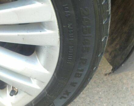 Черный Опель Инсигния, объемом двигателя 2 л и пробегом 261 тыс. км за 9300 $, фото 3 на Automoto.ua