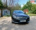 Черный Опель Инсигния, объемом двигателя 1.96 л и пробегом 205 тыс. км за 10000 $, фото 1 на Automoto.ua