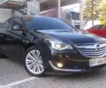 Черный Опель Инсигния, объемом двигателя 2 л и пробегом 261 тыс. км за 9300 $, фото 1 на Automoto.ua