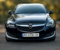 Чорний Опель Інсігнія, об'ємом двигуна 1.6 л та пробігом 266 тис. км за 10000 $, фото 1 на Automoto.ua