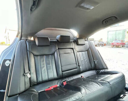 Чорний Опель Інсігнія, об'ємом двигуна 1.6 л та пробігом 245 тис. км за 10500 $, фото 2 на Automoto.ua