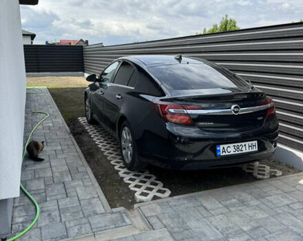 Чорний Опель Інсігнія, об'ємом двигуна 1.6 л та пробігом 245 тис. км за 10500 $, фото 1 на Automoto.ua