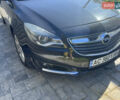 Чорний Опель Інсігнія, об'ємом двигуна 1.6 л та пробігом 245 тис. км за 10500 $, фото 4 на Automoto.ua
