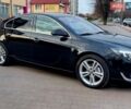 Чорний Опель Інсігнія, об'ємом двигуна 1.96 л та пробігом 191 тис. км за 13700 $, фото 8 на Automoto.ua