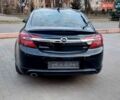 Чорний Опель Інсігнія, об'ємом двигуна 1.96 л та пробігом 191 тис. км за 13700 $, фото 4 на Automoto.ua
