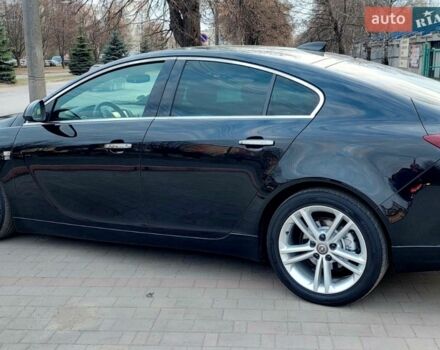 Чорний Опель Інсігнія, об'ємом двигуна 1.96 л та пробігом 191 тис. км за 13700 $, фото 2 на Automoto.ua