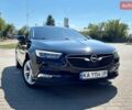 Чорний Опель Інсігнія, об'ємом двигуна 1.6 л та пробігом 165 тис. км за 14800 $, фото 1 на Automoto.ua