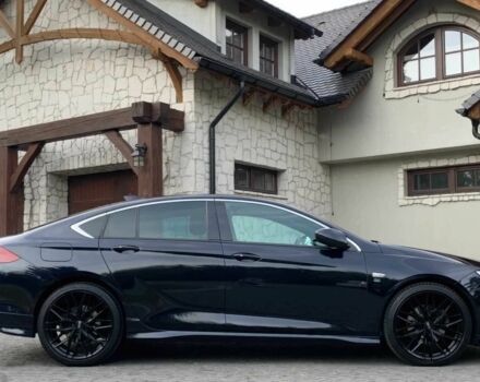 Черный Опель Инсигния, объемом двигателя 2 л и пробегом 78 тыс. км за 11500 $, фото 4 на Automoto.ua