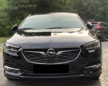 Черный Опель Инсигния, объемом двигателя 2 л и пробегом 78 тыс. км за 11500 $, фото 1 на Automoto.ua
