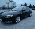 Черный Опель Инсигния, объемом двигателя 2 л и пробегом 136 тыс. км за 9100 $, фото 1 на Automoto.ua