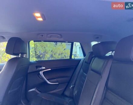 Черный Опель Инсигния, объемом двигателя 1.96 л и пробегом 208 тыс. км за 7750 $, фото 43 на Automoto.ua