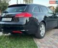 Чорний Опель Інсігнія, об'ємом двигуна 2 л та пробігом 312 тис. км за 5999 $, фото 11 на Automoto.ua