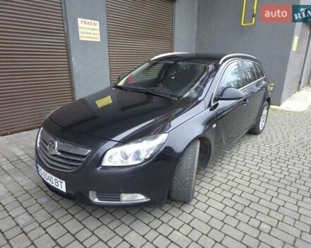 Чорний Опель Інсігнія, об'ємом двигуна 1.96 л та пробігом 412 тис. км за 6950 $, фото 7 на Automoto.ua
