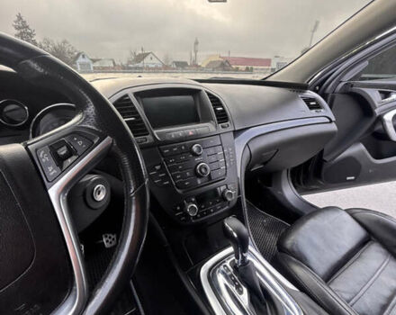 Черный Опель Инсигния, объемом двигателя 2 л и пробегом 265 тыс. км за 7250 $, фото 4 на Automoto.ua