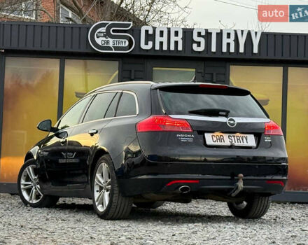 Черный Опель Инсигния, объемом двигателя 1.96 л и пробегом 242 тыс. км за 7600 $, фото 8 на Automoto.ua