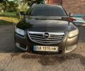 Черный Опель Инсигния, объемом двигателя 2 л и пробегом 324 тыс. км за 7200 $, фото 1 на Automoto.ua