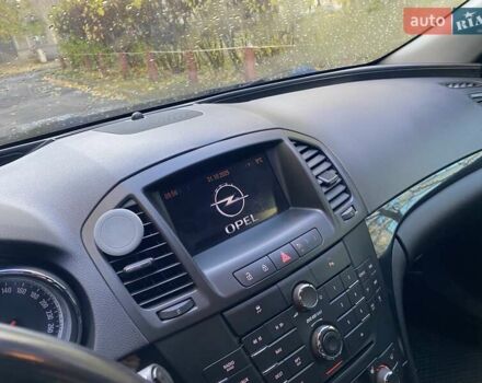 Черный Опель Инсигния, объемом двигателя 1.96 л и пробегом 208 тыс. км за 7750 $, фото 66 на Automoto.ua