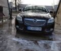 Черный Опель Инсигния, объемом двигателя 2 л и пробегом 260 тыс. км за 6500 $, фото 1 на Automoto.ua