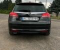 Чорний Опель Інсігнія, об'ємом двигуна 2 л та пробігом 249 тис. км за 8600 $, фото 6 на Automoto.ua