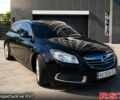 Черный Опель Инсигния, объемом двигателя 2 л и пробегом 205 тыс. км за 7900 $, фото 1 на Automoto.ua