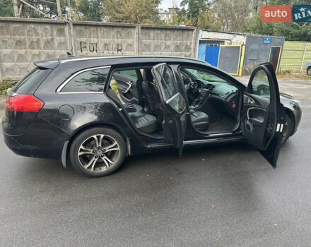 Чорний Опель Інсігнія, об'ємом двигуна 1.96 л та пробігом 180 тис. км за 6800 $, фото 4 на Automoto.ua