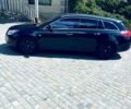 Чорний Опель Інсігнія, об'ємом двигуна 2 л та пробігом 207 тис. км за 7300 $, фото 4 на Automoto.ua