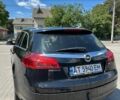 Черный Опель Инсигния, объемом двигателя 2 л и пробегом 240 тыс. км за 6750 $, фото 5 на Automoto.ua