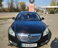 Черный Опель Инсигния, объемом двигателя 2 л и пробегом 298 тыс. км за 6900 $, фото 2 на Automoto.ua