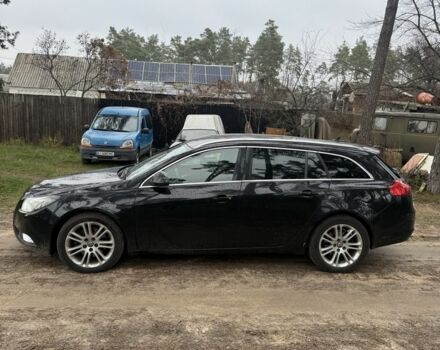 Черный Опель Инсигния, объемом двигателя 2 л и пробегом 330 тыс. км за 2750 $, фото 1 на Automoto.ua