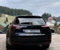 Чорний Опель Інсігнія, об'ємом двигуна 2 л та пробігом 308 тис. км за 6907 $, фото 6 на Automoto.ua