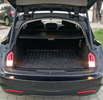 Черный Опель Инсигния, объемом двигателя 1.96 л и пробегом 238 тыс. км за 8900 $, фото 7 на Automoto.ua