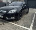 Чорний Опель Інсігнія, об'ємом двигуна 2 л та пробігом 234 тис. км за 8600 $, фото 1 на Automoto.ua