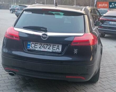 Чорний Опель Інсігнія, об'ємом двигуна 1.96 л та пробігом 251 тис. км за 6800 $, фото 5 на Automoto.ua