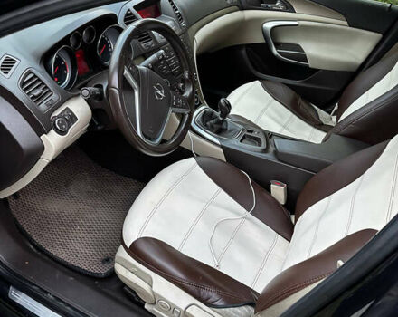 Черный Опель Инсигния, объемом двигателя 2 л и пробегом 266 тыс. км за 7600 $, фото 1 на Automoto.ua