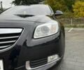 Чорний Опель Інсігнія, об'ємом двигуна 1.96 л та пробігом 248 тис. км за 8100 $, фото 10 на Automoto.ua
