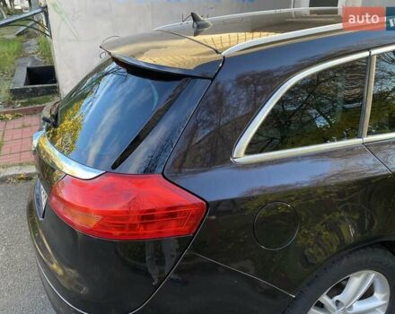 Черный Опель Инсигния, объемом двигателя 1.96 л и пробегом 208 тыс. км за 7750 $, фото 22 на Automoto.ua