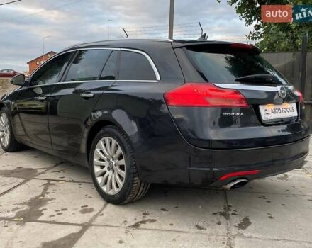 Черный Опель Инсигния, объемом двигателя 1.96 л и пробегом 304 тыс. км за 6990 $, фото 6 на Automoto.ua