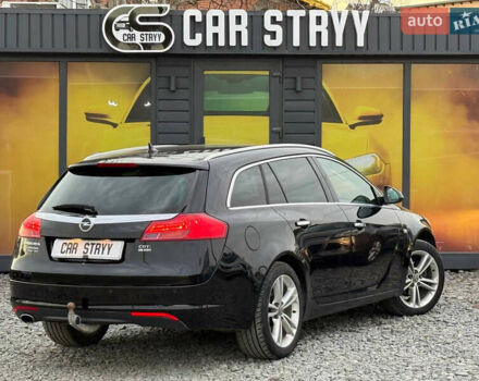 Черный Опель Инсигния, объемом двигателя 1.96 л и пробегом 242 тыс. км за 7600 $, фото 12 на Automoto.ua