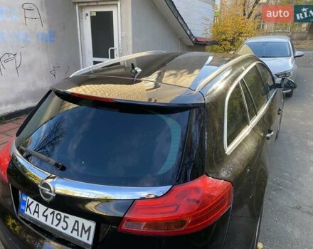 Черный Опель Инсигния, объемом двигателя 1.96 л и пробегом 208 тыс. км за 7750 $, фото 13 на Automoto.ua