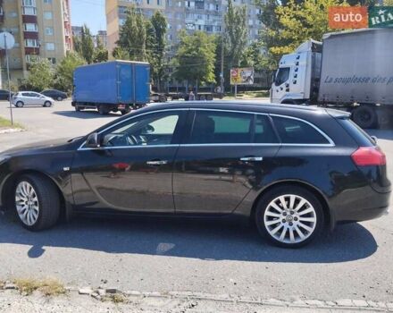 Чорний Опель Інсігнія, об'ємом двигуна 2 л та пробігом 211 тис. км за 9900 $, фото 2 на Automoto.ua