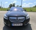 Черный Опель Инсигния, объемом двигателя 2 л и пробегом 250 тыс. км за 9800 $, фото 1 на Automoto.ua