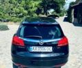 Чорний Опель Інсігнія, об'ємом двигуна 2 л та пробігом 207 тис. км за 7300 $, фото 6 на Automoto.ua