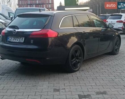 Чорний Опель Інсігнія, об'ємом двигуна 1.96 л та пробігом 251 тис. км за 6800 $, фото 7 на Automoto.ua