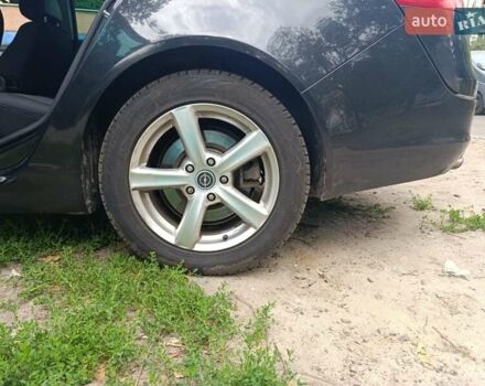 Черный Опель Инсигния, объемом двигателя 1.96 л и пробегом 236 тыс. км за 7500 $, фото 7 на Automoto.ua