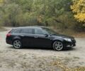 Черный Опель Инсигния, объемом двигателя 2 л и пробегом 275 тыс. км за 8500 $, фото 1 на Automoto.ua
