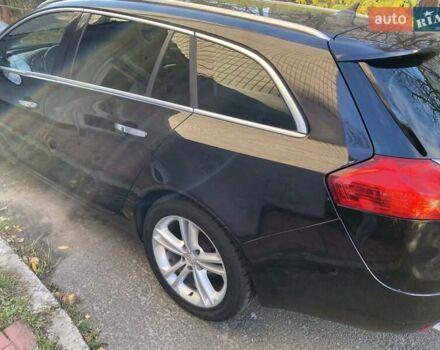 Черный Опель Инсигния, объемом двигателя 1.96 л и пробегом 208 тыс. км за 7750 $, фото 10 на Automoto.ua